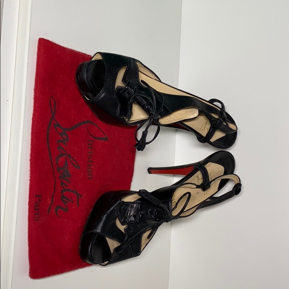 Louboutin “Sometimes” platform lace-up stilettos